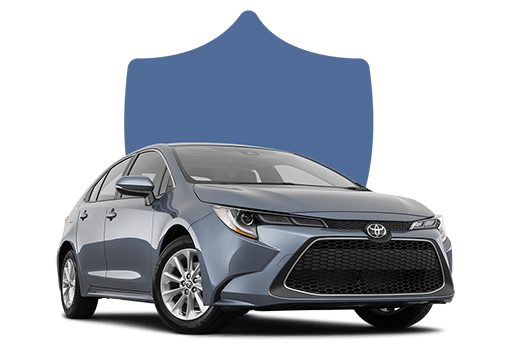 A car in front of a shield